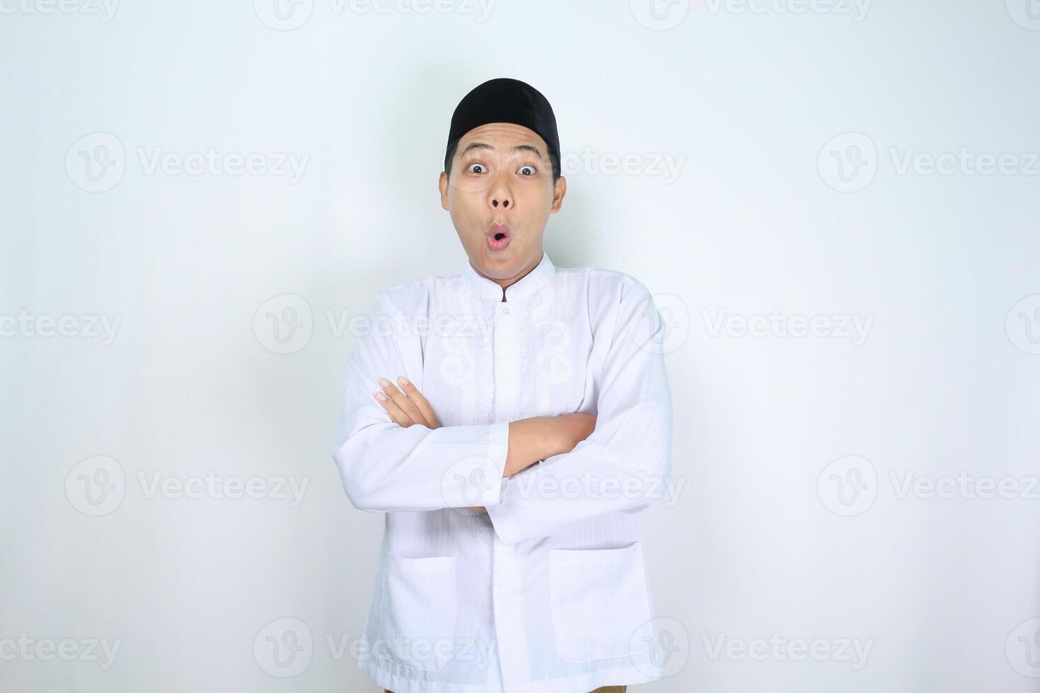 shocked muslim man asian crossed hand isolated on white background photo