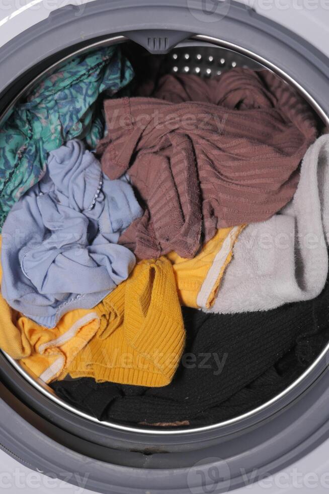 close up of cloths in a washing machine. photo