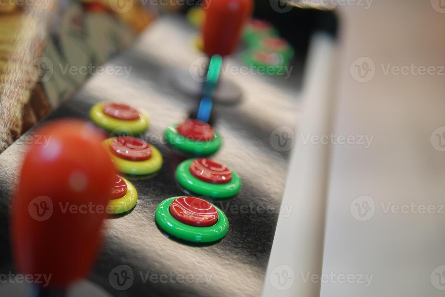 closeup of button on games machine. photo