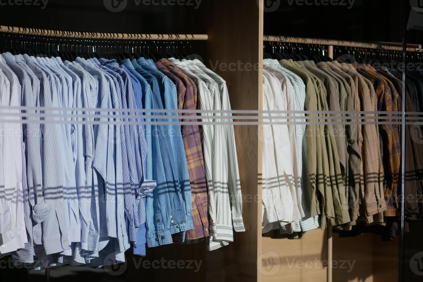 Formal wear fashion store, Men ,striped shirt on hanger. photo