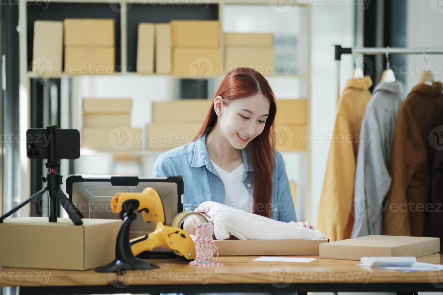Small Business Owner Preparing Order for Shipment photo