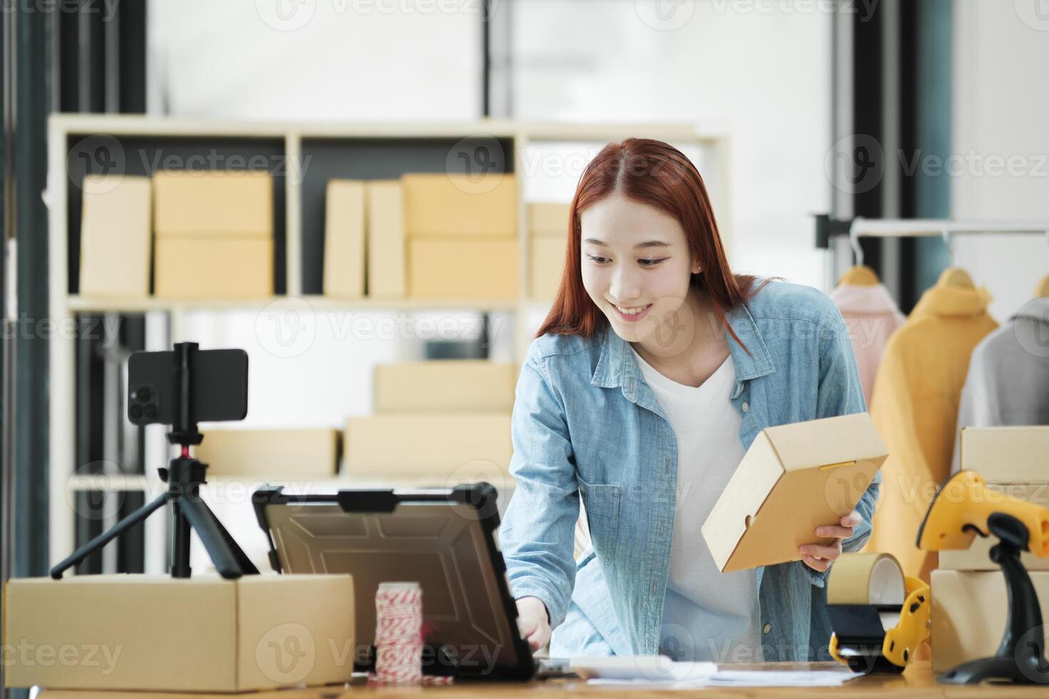 Online Shop Owner Managing Orders photo