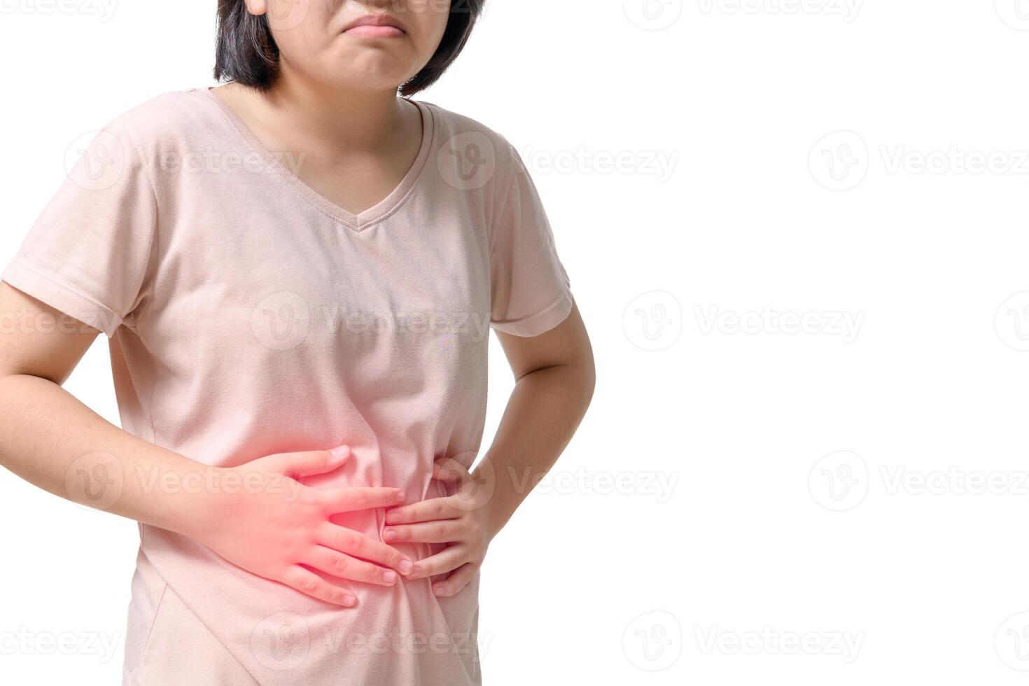 Asian girl having stomach ache, bending and holding hands on belly isolated on white background, photo