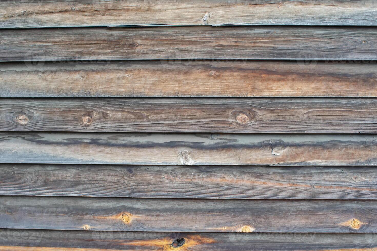 Classic background of wooden planks of uneven gray color. photo