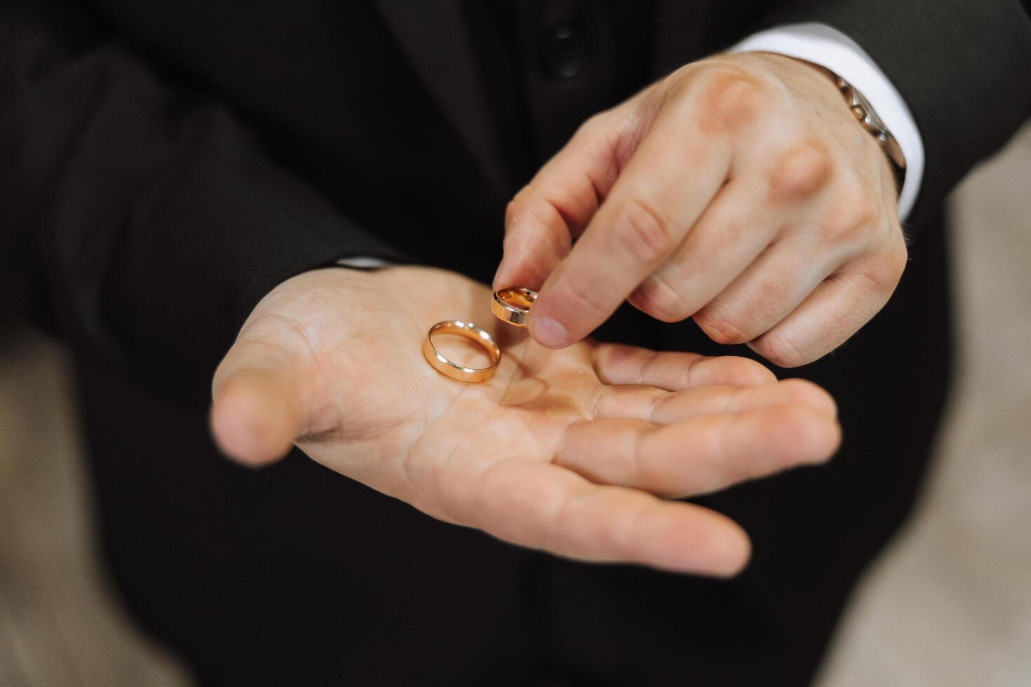 Two gold wedding rings for brides as a symbol of eternity. Everything is ready for the wedding ceremony. An offer of a hand and a heart photo