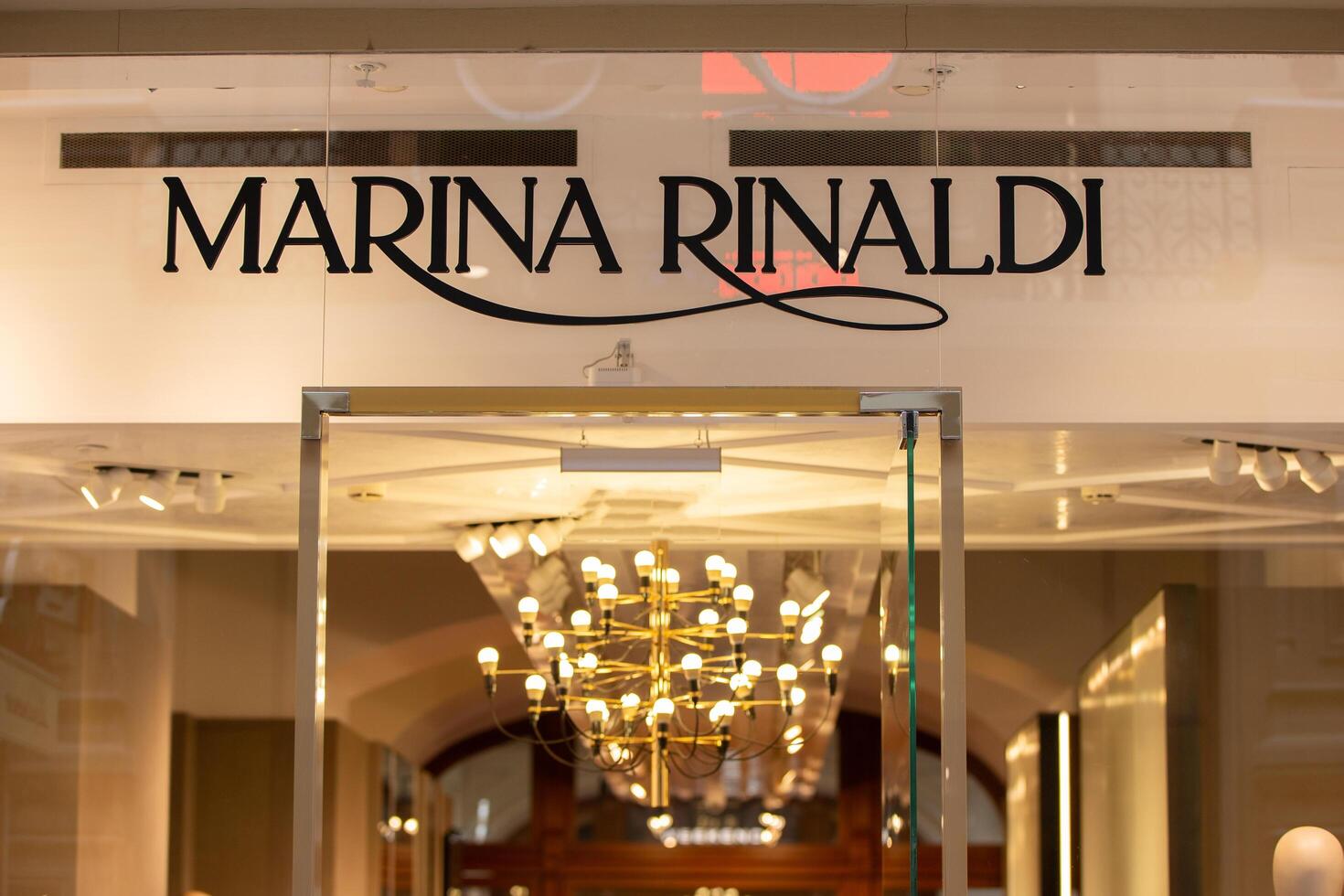 March 03, 2023. Moscow Central store. Showcase of the store of the Italian brand Marina Rinaldi. photo