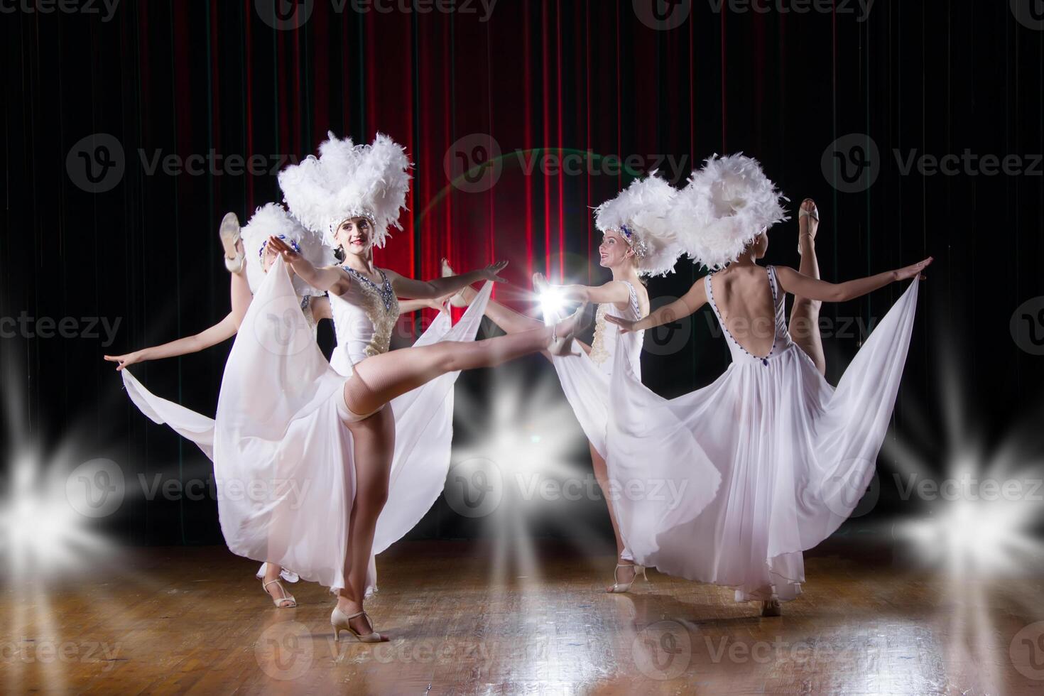 Cabaret.Girls dance variety show. Dancers in white dresses perform modern dance cabaret photo