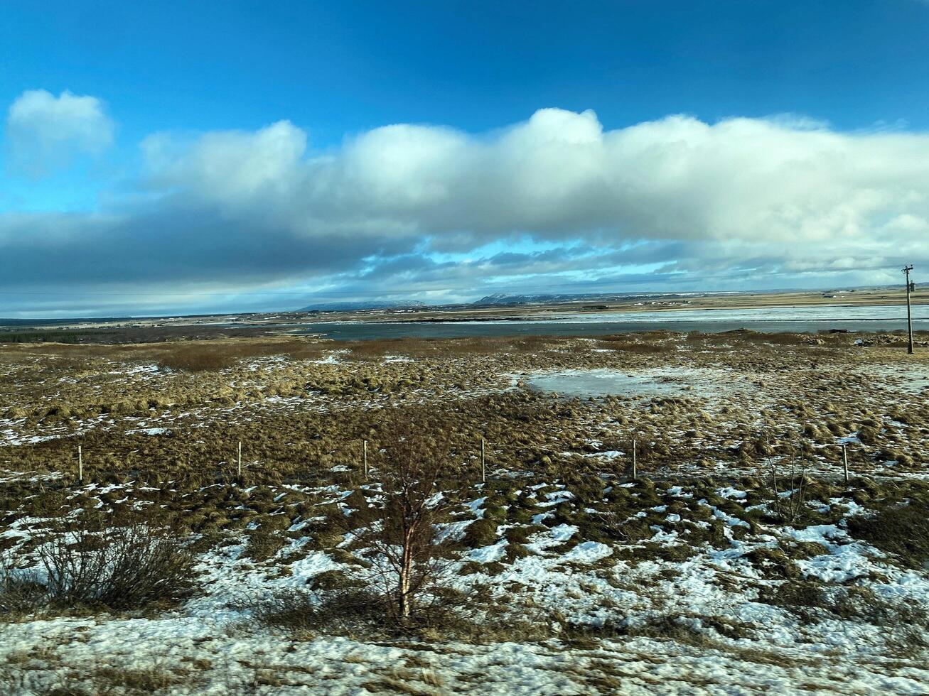 A view of the Iceland Countryside in the winter covered with Snow near the Gulfos Waterfall photo