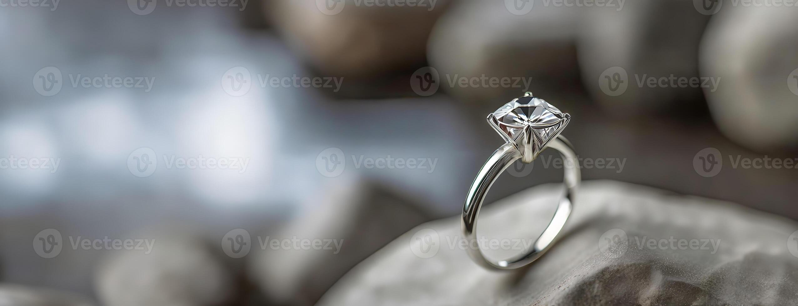 AI Generated An elegant engagement ring perched on a stone, with its diamond catching the soft light. Quiet promises, with the blurred natural background lending a timeless quality to the scene. photo