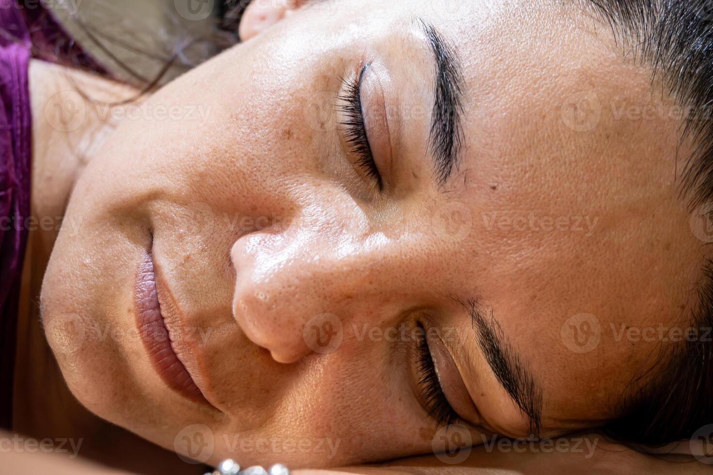 Eyes with permanent tattoo on the eyelids to mark the outline. photo