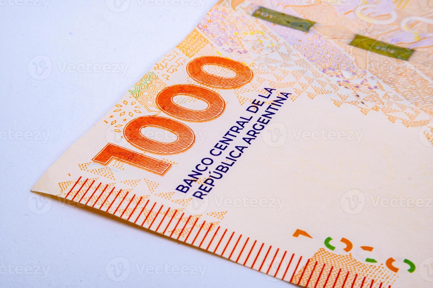 Bill of one thousand Argentine pesos highlighting the number. photo