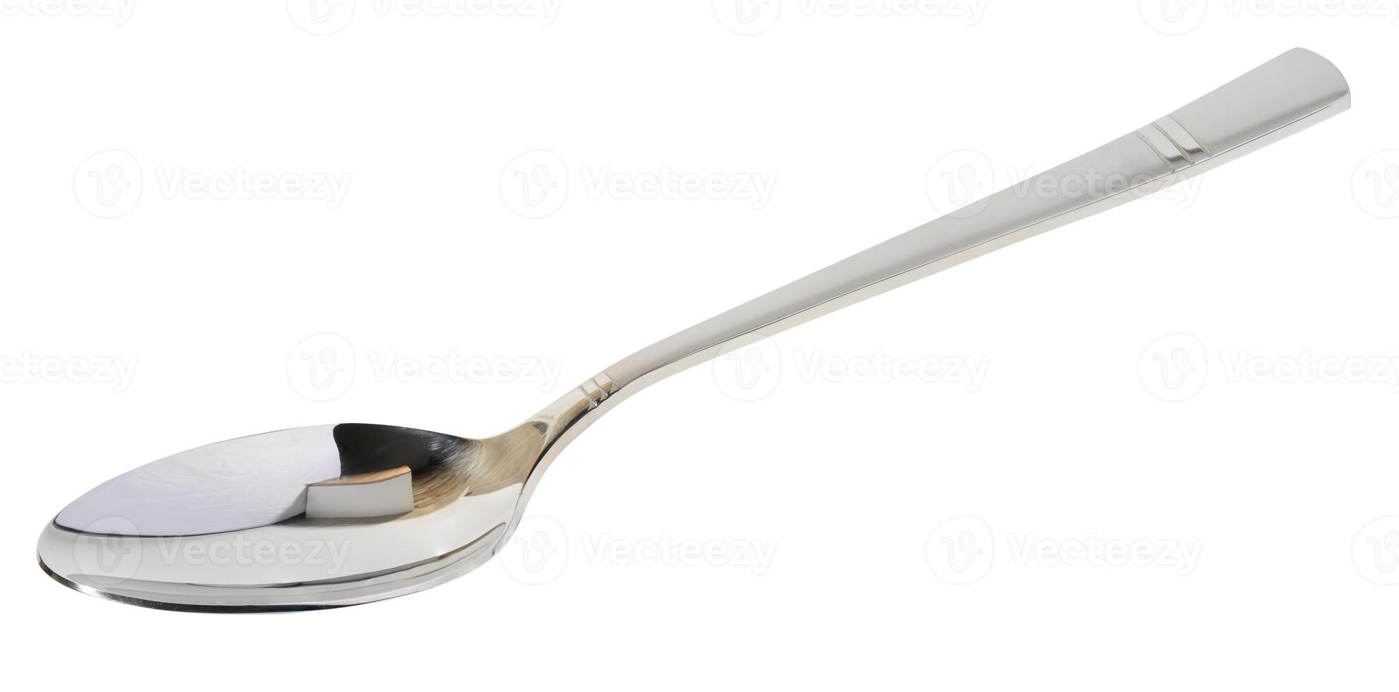 New steel dinner spoon on isolated background photo