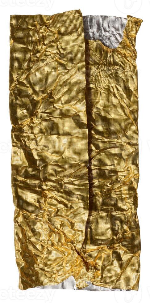 Sheet of golden foil isolated on white background photo