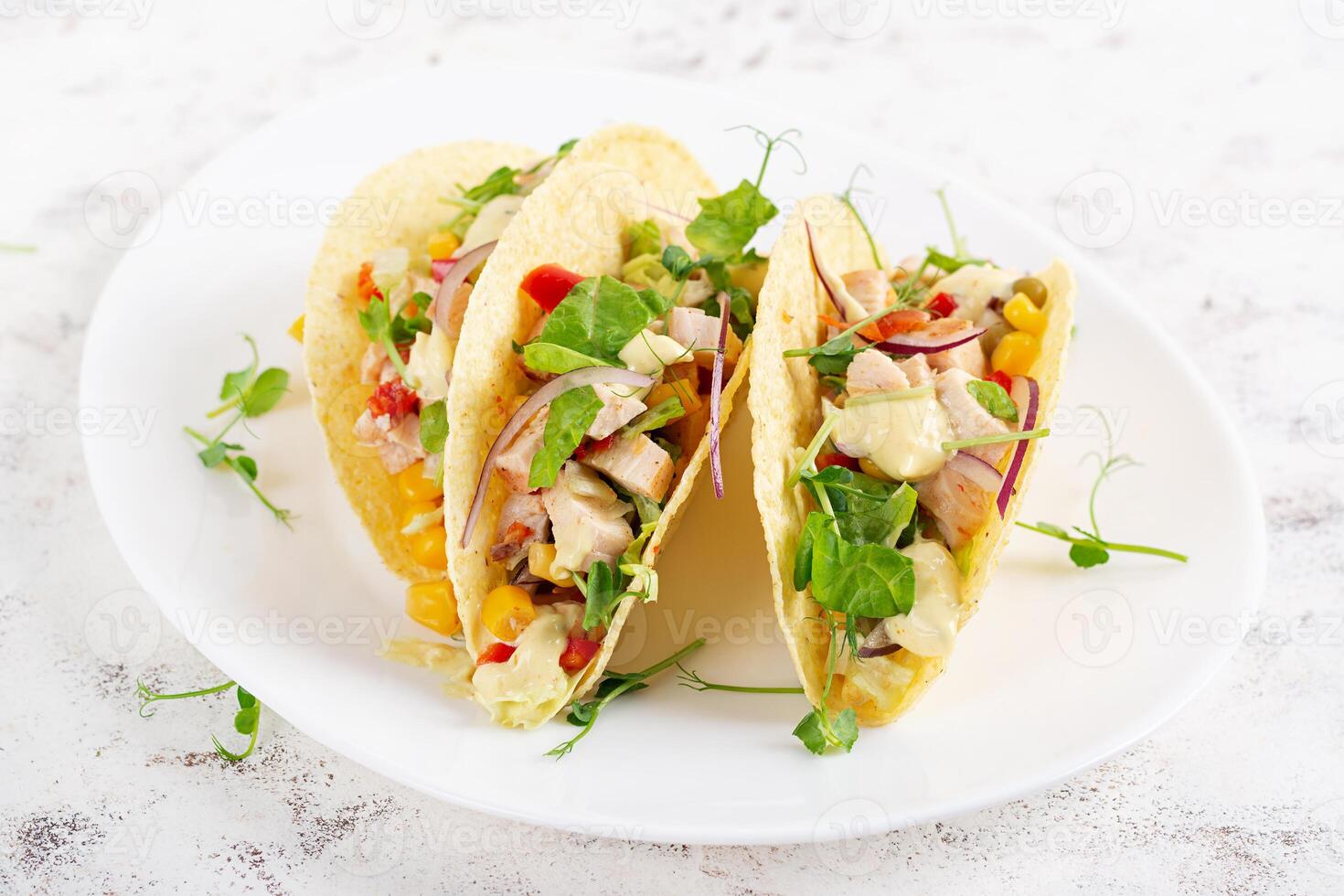 Mexican tacos with chicken meat, corn and salsa. Healthy tacos. Diet menu. Mexican taco. photo