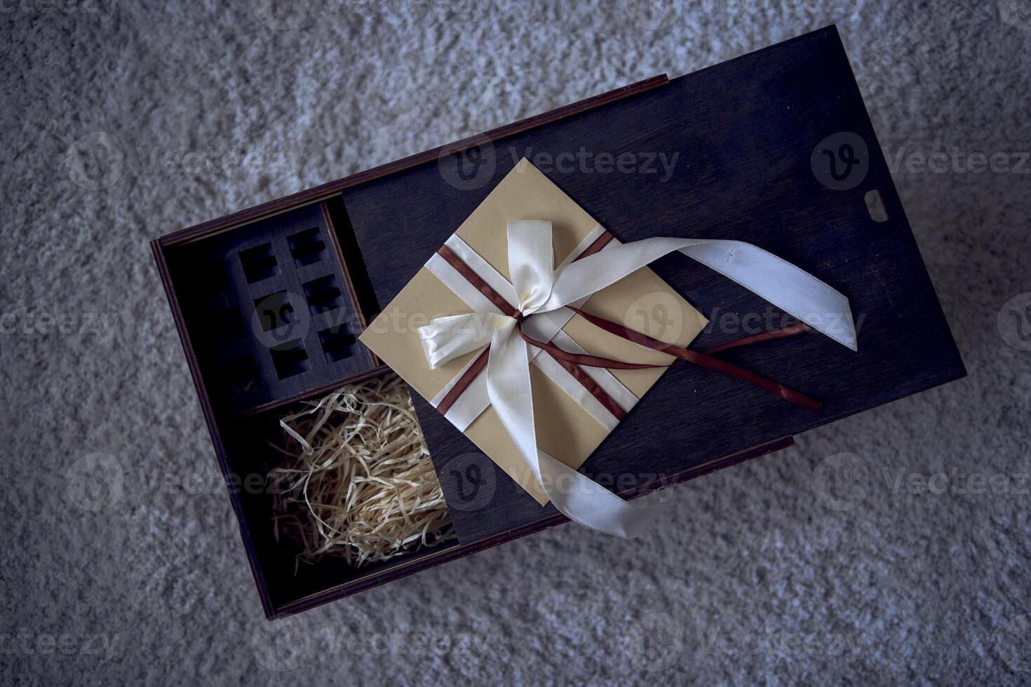 gift certificate on a wooden whiskey box photo