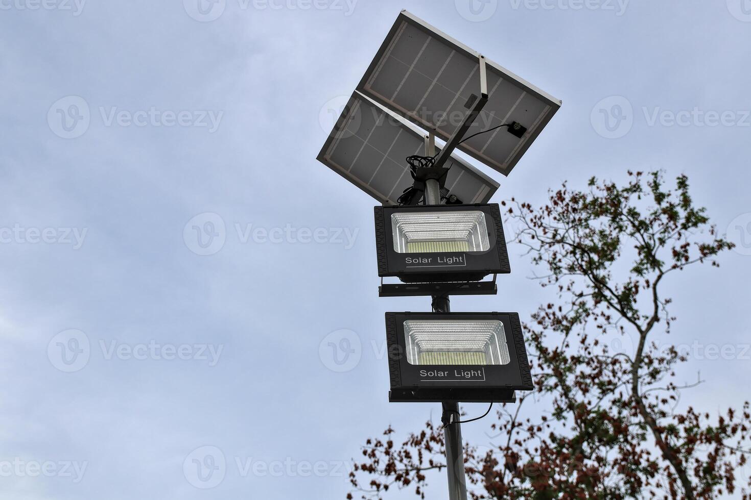 Solar lights installed outdoors, ready to use at night. photo