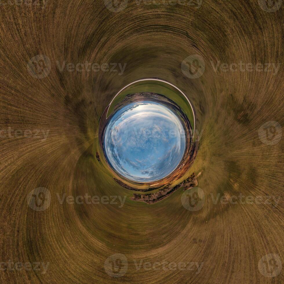 blue hole sphere little planet inside sand round frame background photo