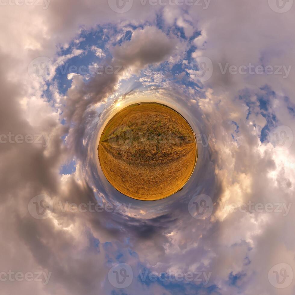 simple tiny planet without buildings in blue sky with beautiful clouds. Transformation of spherical panorama 360 degrees. Spherical abstract aerial view. Curvature of space. photo