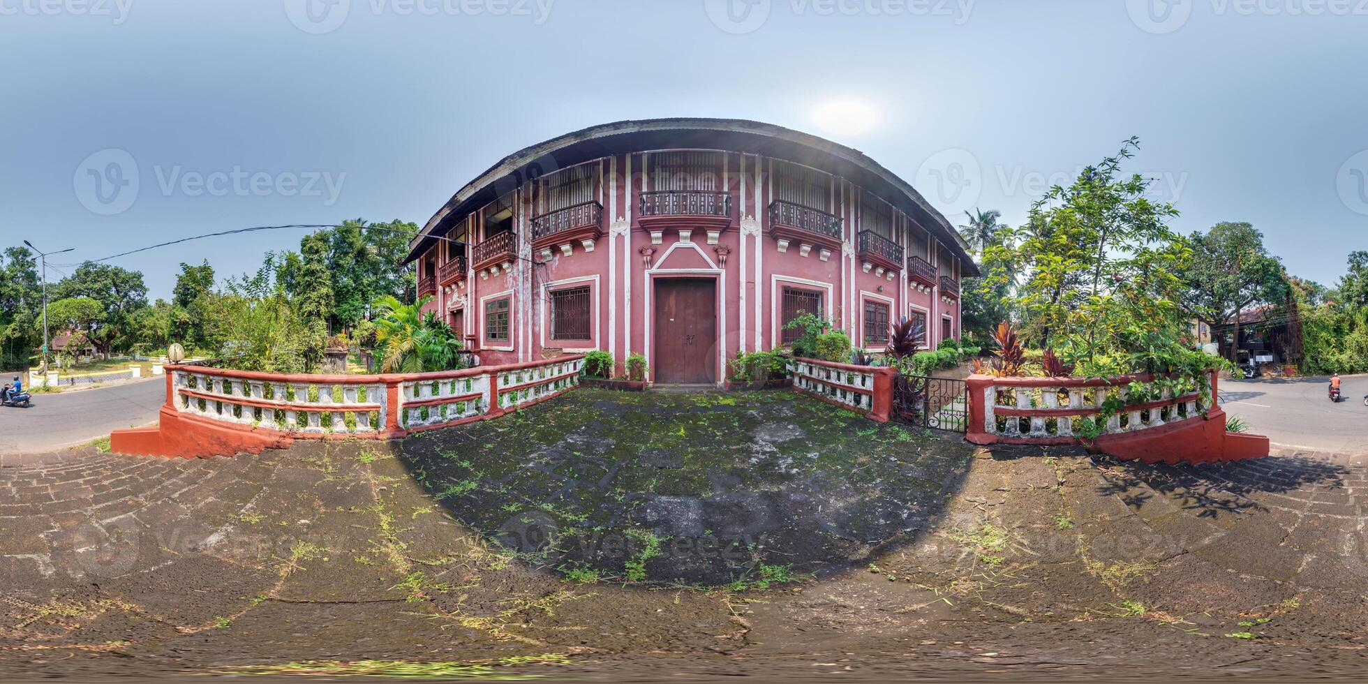 full seamless spherical hdr 360 panorama view among green street with cottages, villas and coconut trees in an indian village in equirectangular projection, ready for VR AR virtual reality photo