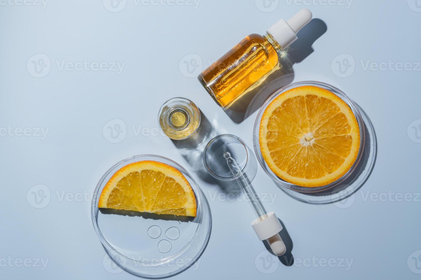 Natural cosmetics laboratory research, bio science, organic skin care, orange fruits and cosmetic oils, beauty from nature. AHA exfoliation testing photo