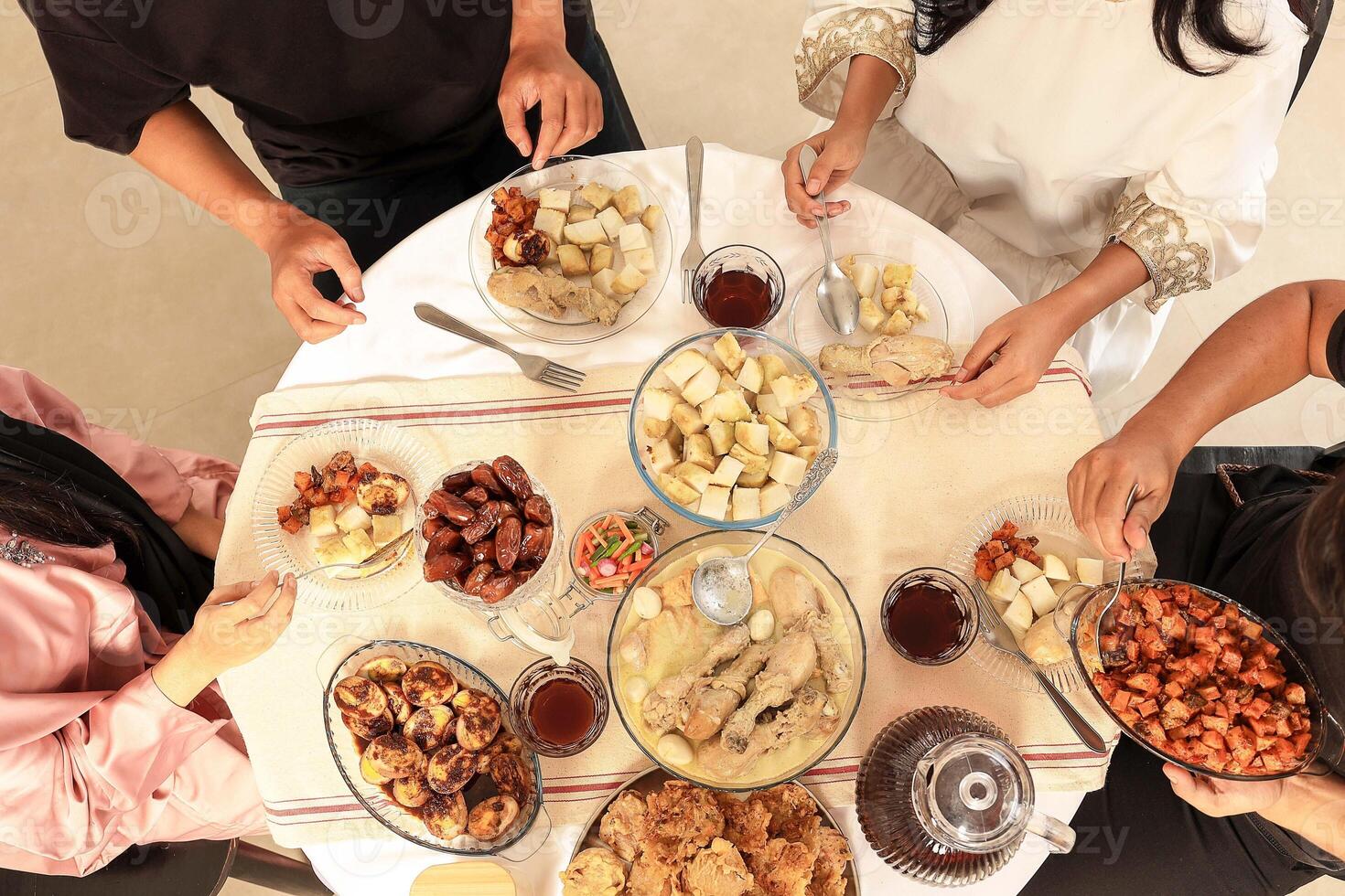 Top View Various Buka Puasa Breaking the Fast Menu on the Table. photo