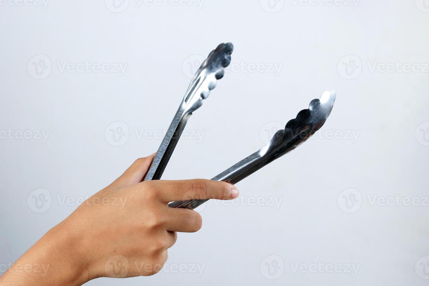 Female Hand Hold Stainless Tongs photo
