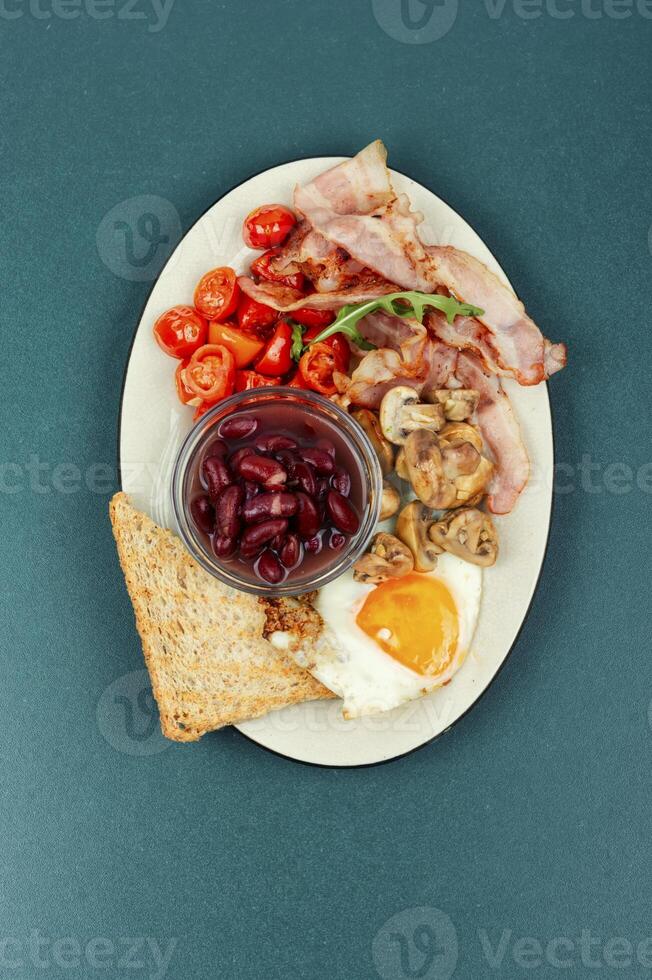 Full English breakfast on a plate. photo