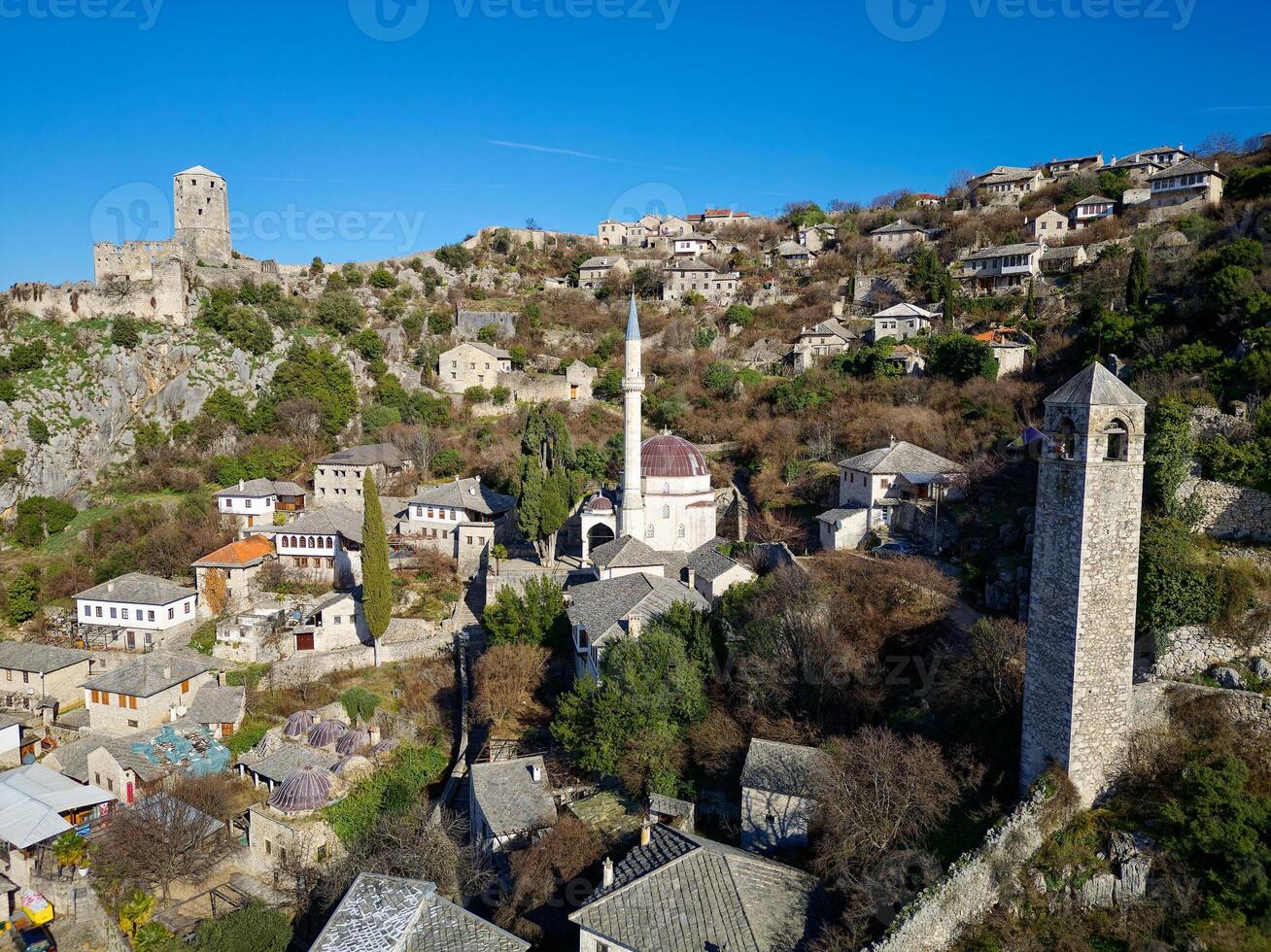 Aerial view of the historic urban site of Pocitelj, a traditional old village from Bosnia and Herzegovina. photo