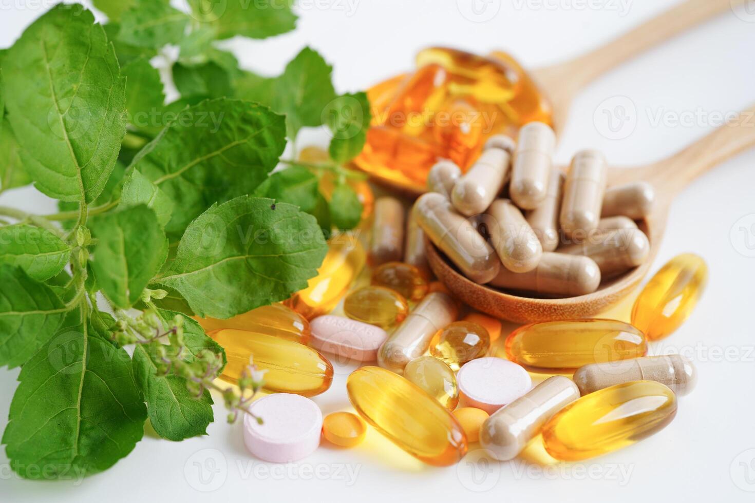 Alternative medicine herbal organic capsule with vitamin E omega 3 fish oil, mineral, drug with herbs leaf natural supplements for healthy good life. photo