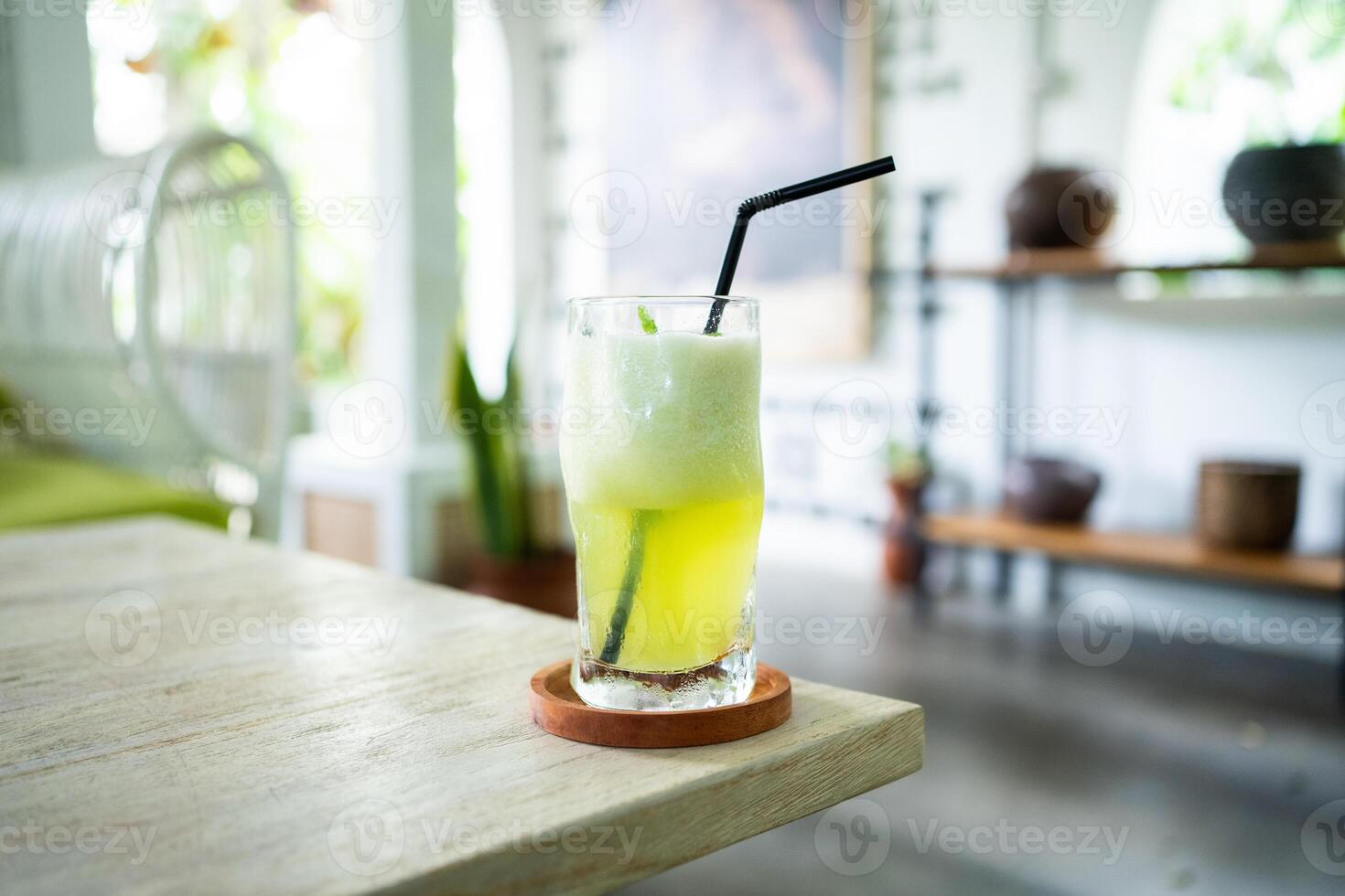 fresh cold melon juice on a table in an elegant cafe. photo