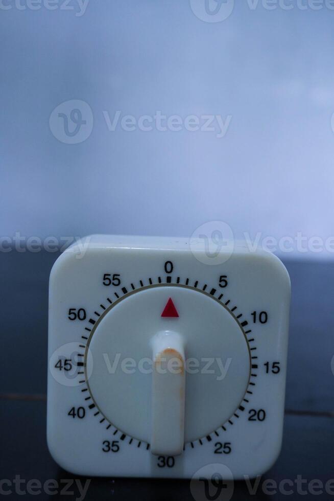 Traditional square manual timer as a timer in the laboratory photo