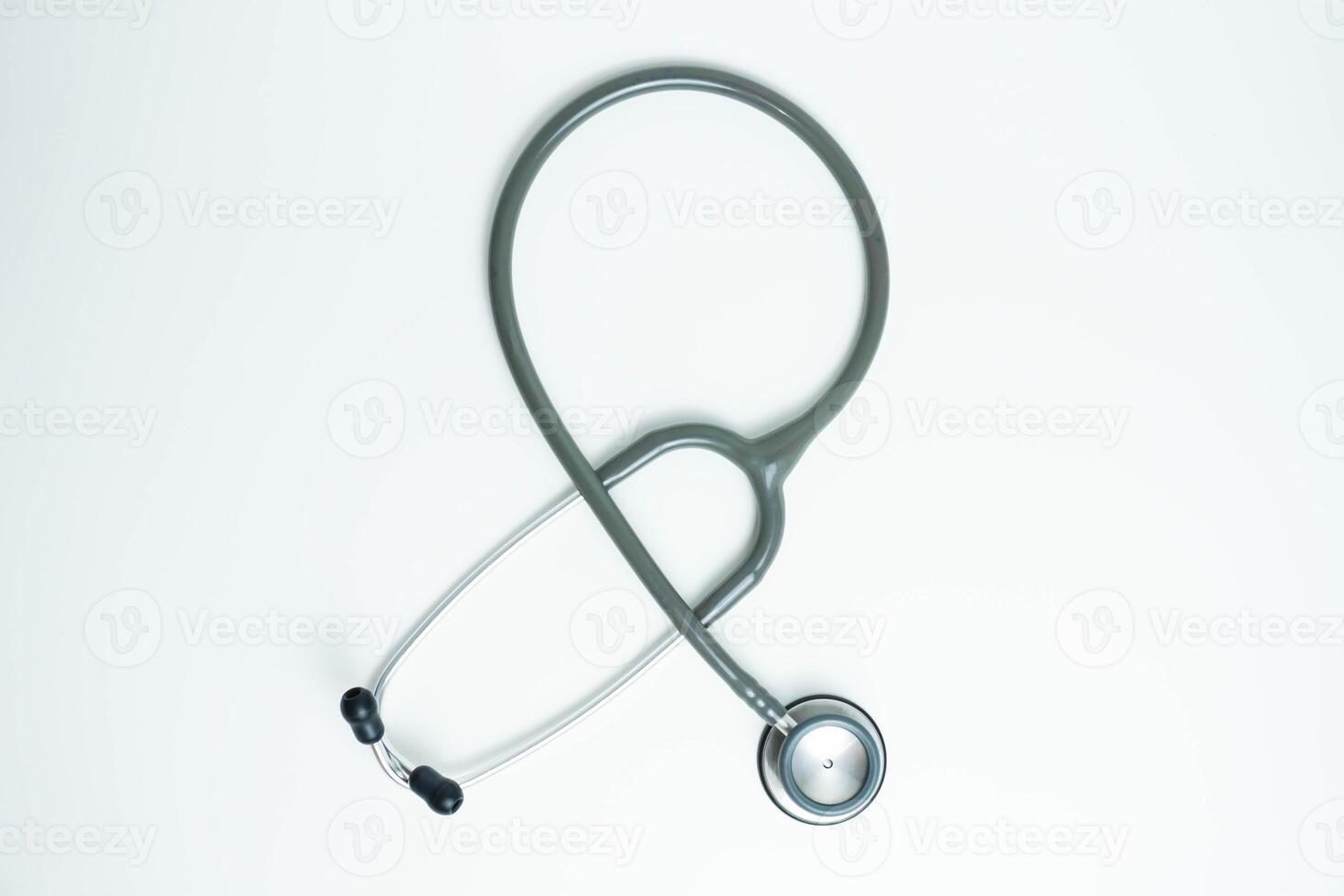 Stethoscope isolated on white background, top view. Medical tool. Health care concept photo