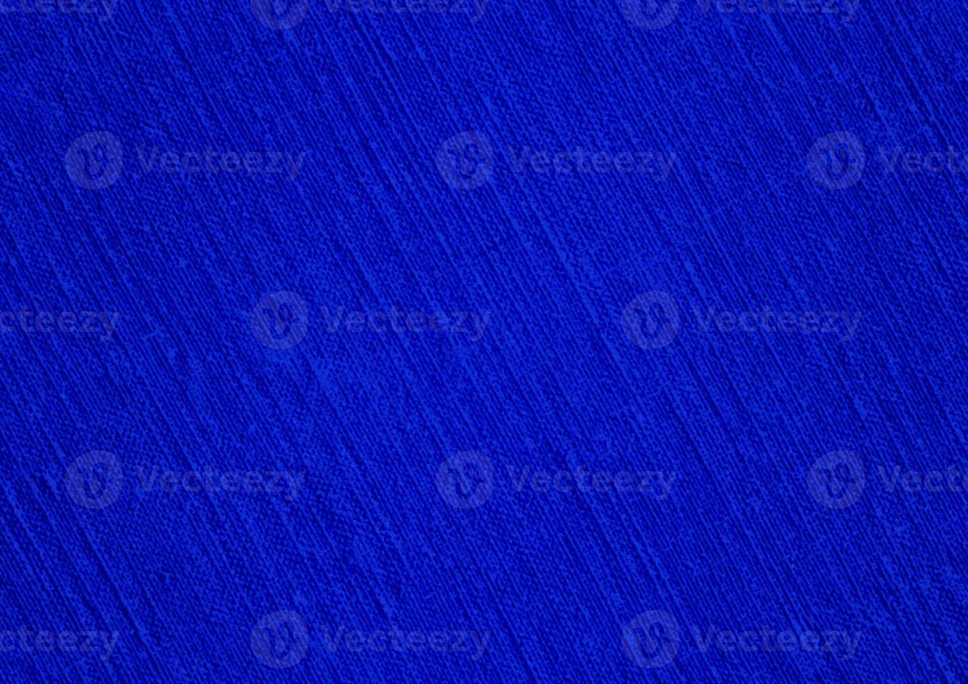 Elegant blue uneven texture background of foil, paper, canvas, wall, brush, fibre, or paint. Realistic blue abstract background. Artistic blue abstract background. For blue background texture. photo