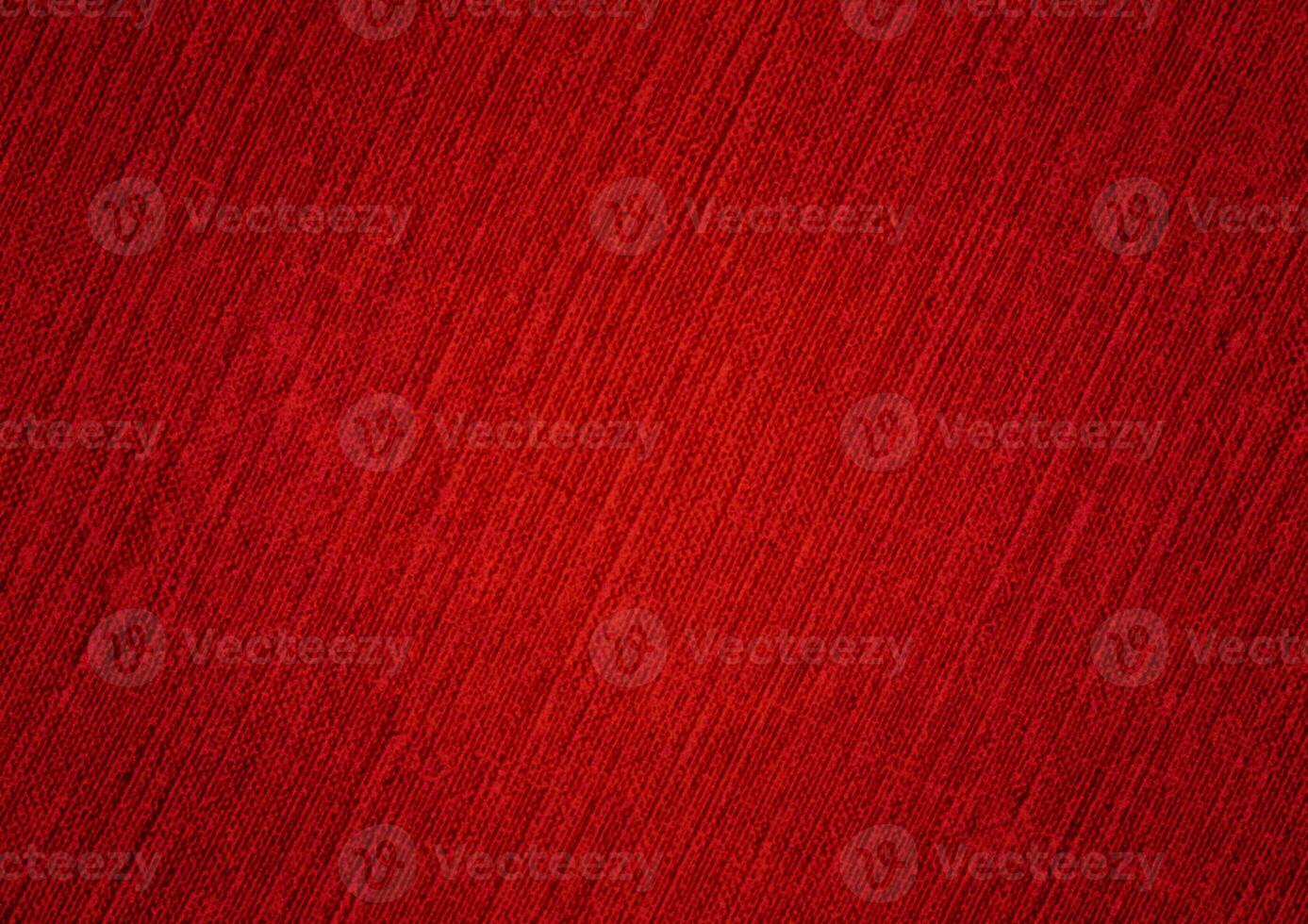 Artistic red uneven texture background of foil, paper, canvas, wall, brush, fibre, or paint. Realistic red abstract background. Available for red background texture. photo