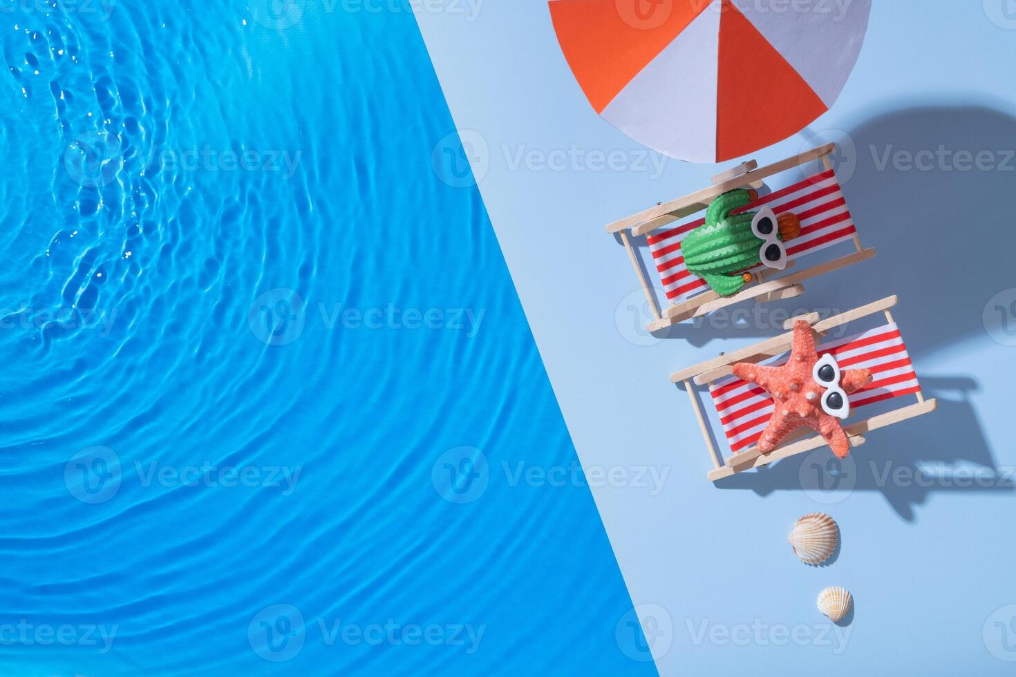 Hot summer in a beach chair by the water in the pool. Fun abstract flat lay composition, top view. photo