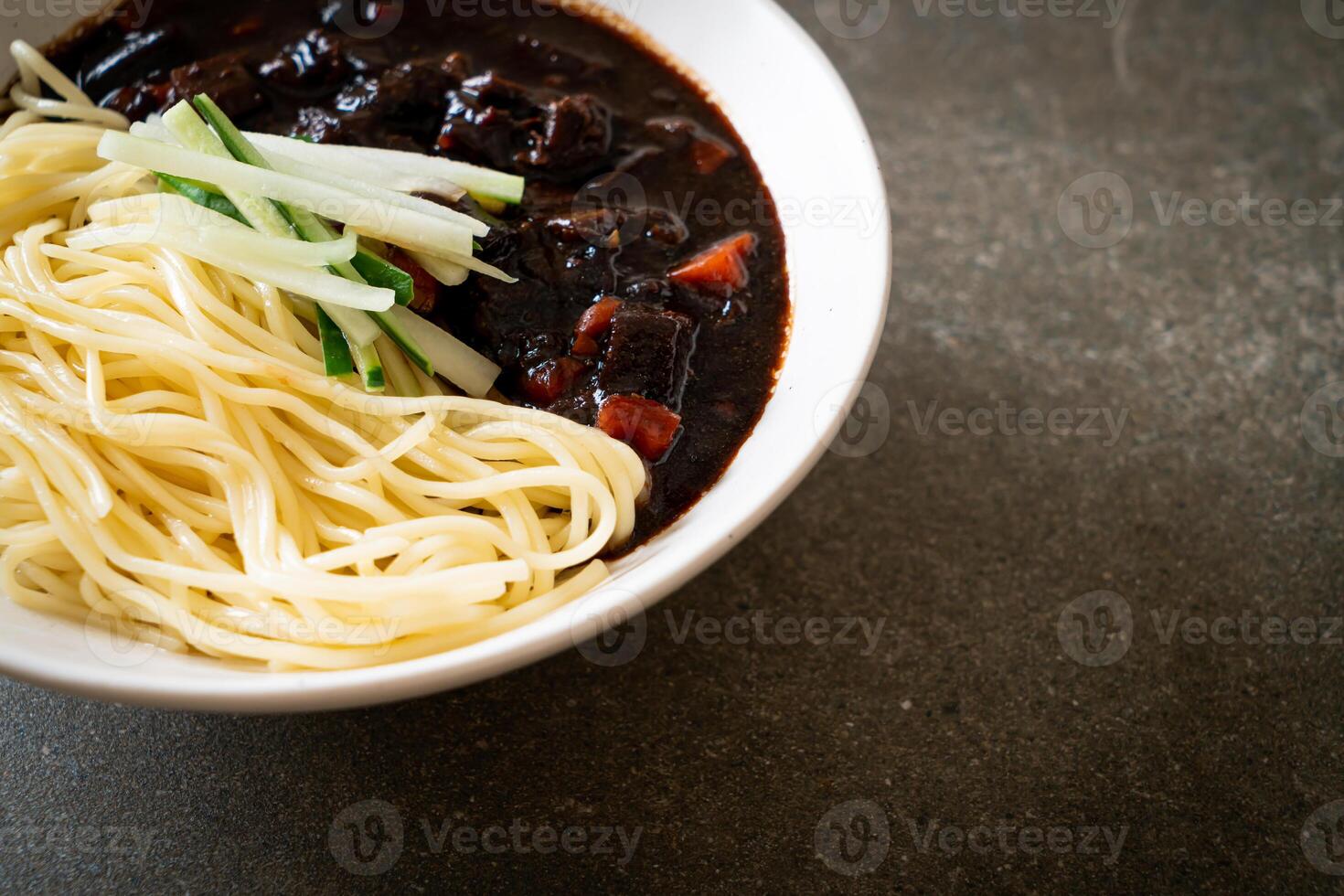 Jajangmyeon or JJajangmyeon is Korean Noodle with Black Sauce photo