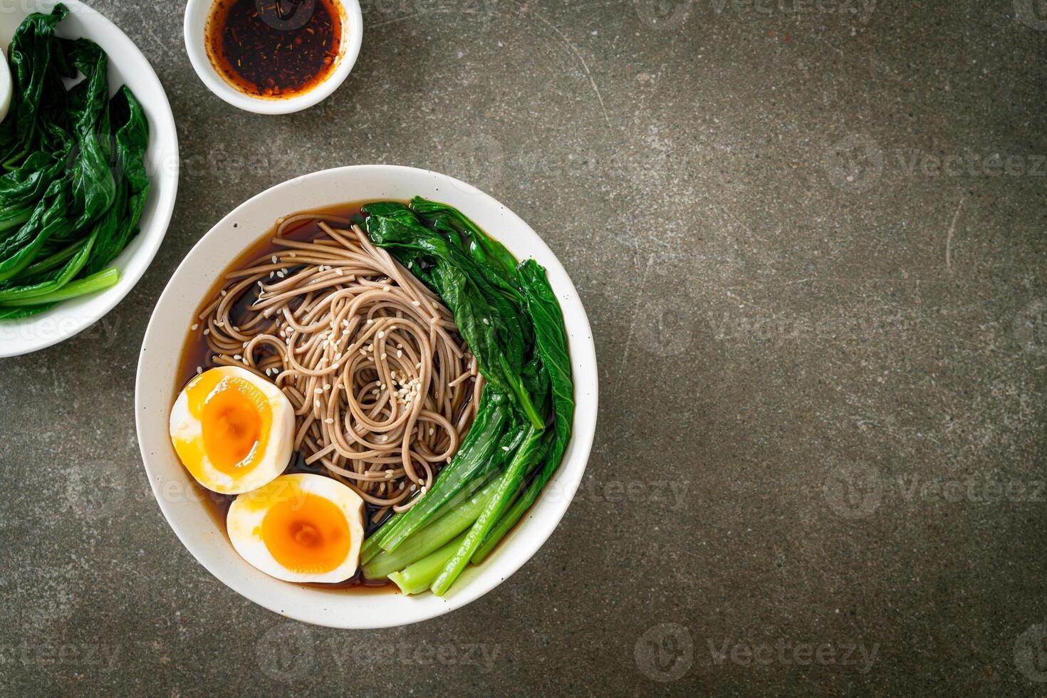 ramen noodles with egg - vegan or vegetarian food style photo