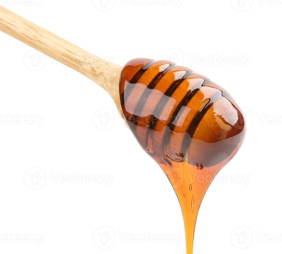 Honey stick isolated on white photo