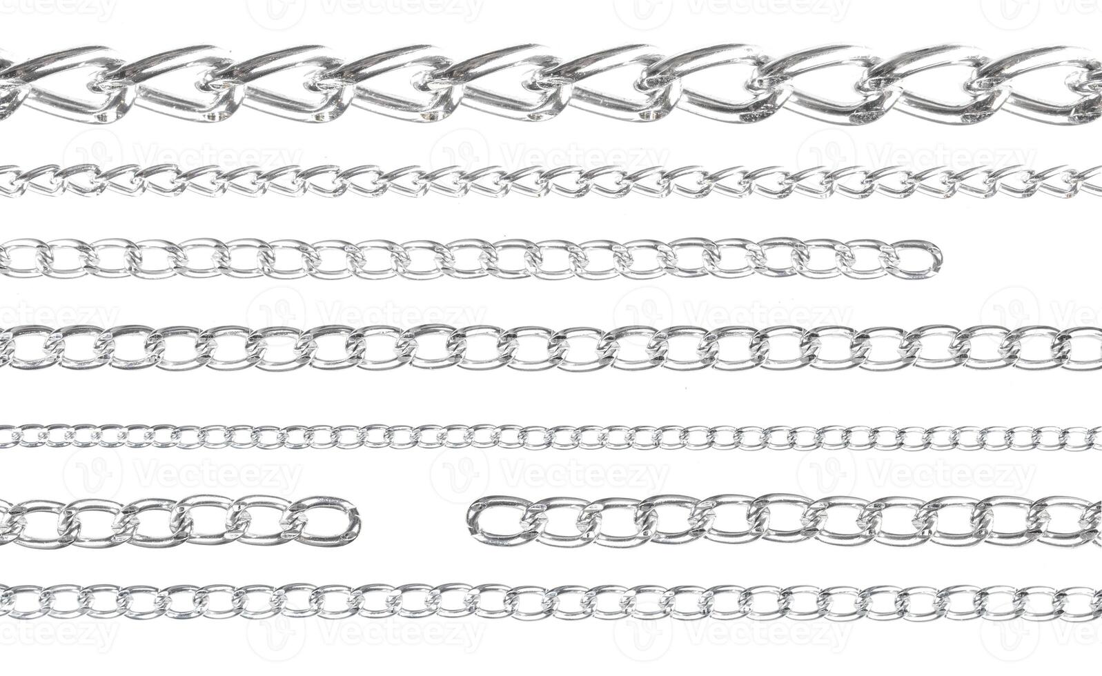 Collection of Silver metal chains isolated on white background photo