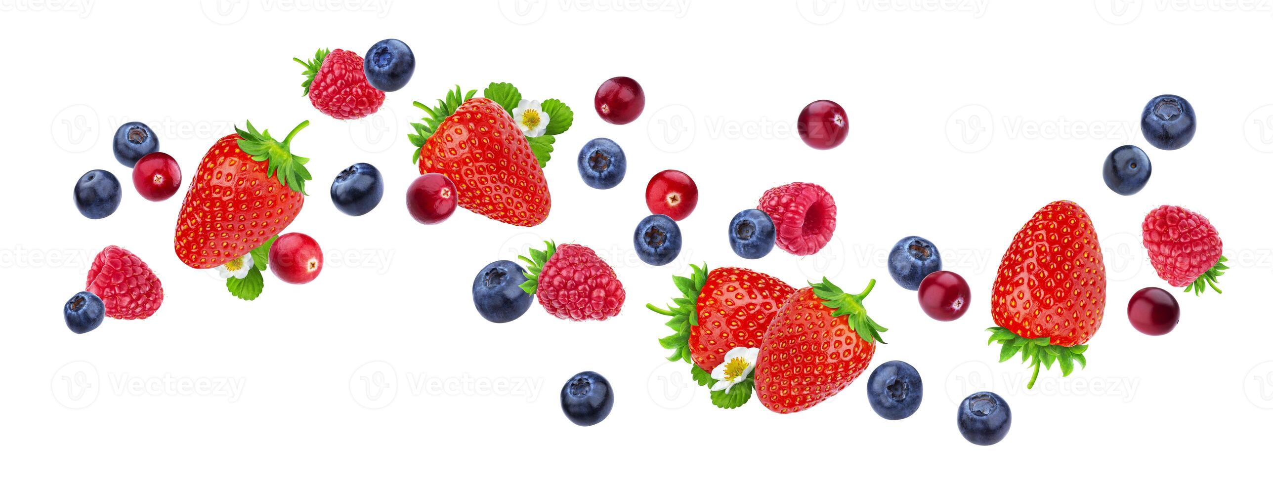 Flying berries isolated on white background with clipping path photo