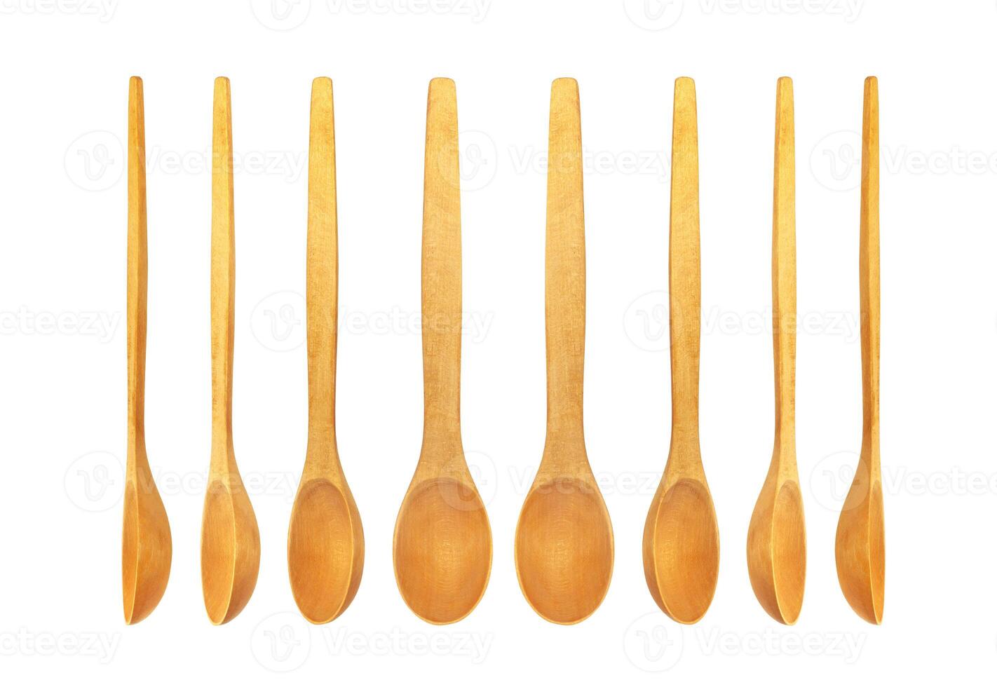 Wooden spoon isolated on white background photo