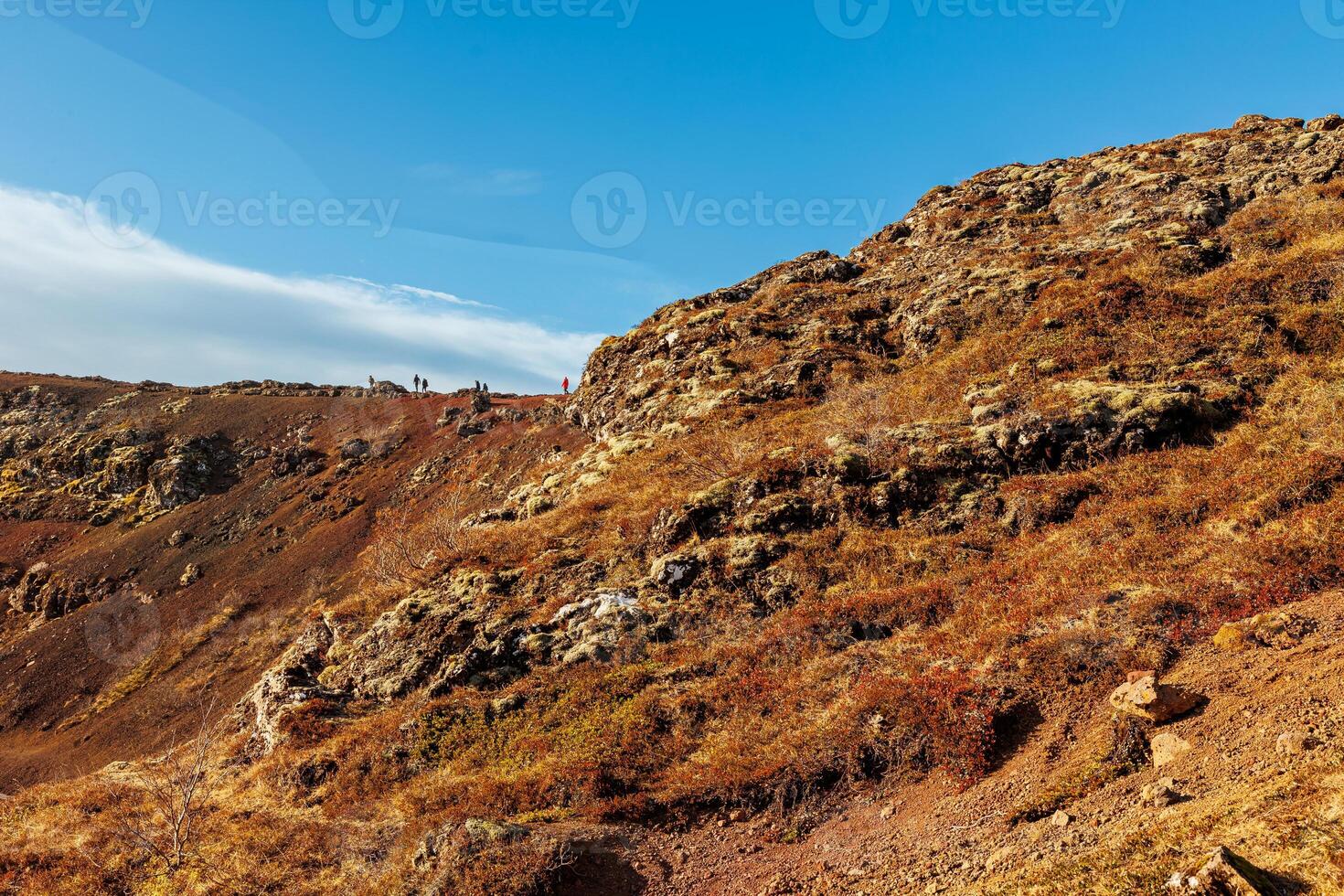 Massive steep mountain cliffs in highlands of Iceland, rock formations creating gorgeous slopes along icelandic valley. Wilderness on northern shoreline created by rocky hills. photo