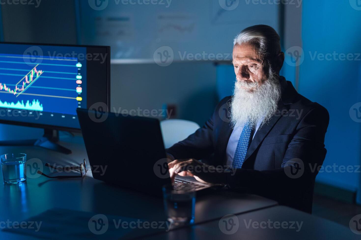 Business stock trader man working on crypto currency markets with blockchain technology - Decentralized finance and stock exchange concept photo