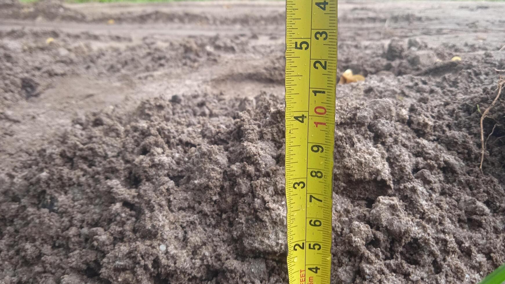 Measuring tape tool on a construction site. photo