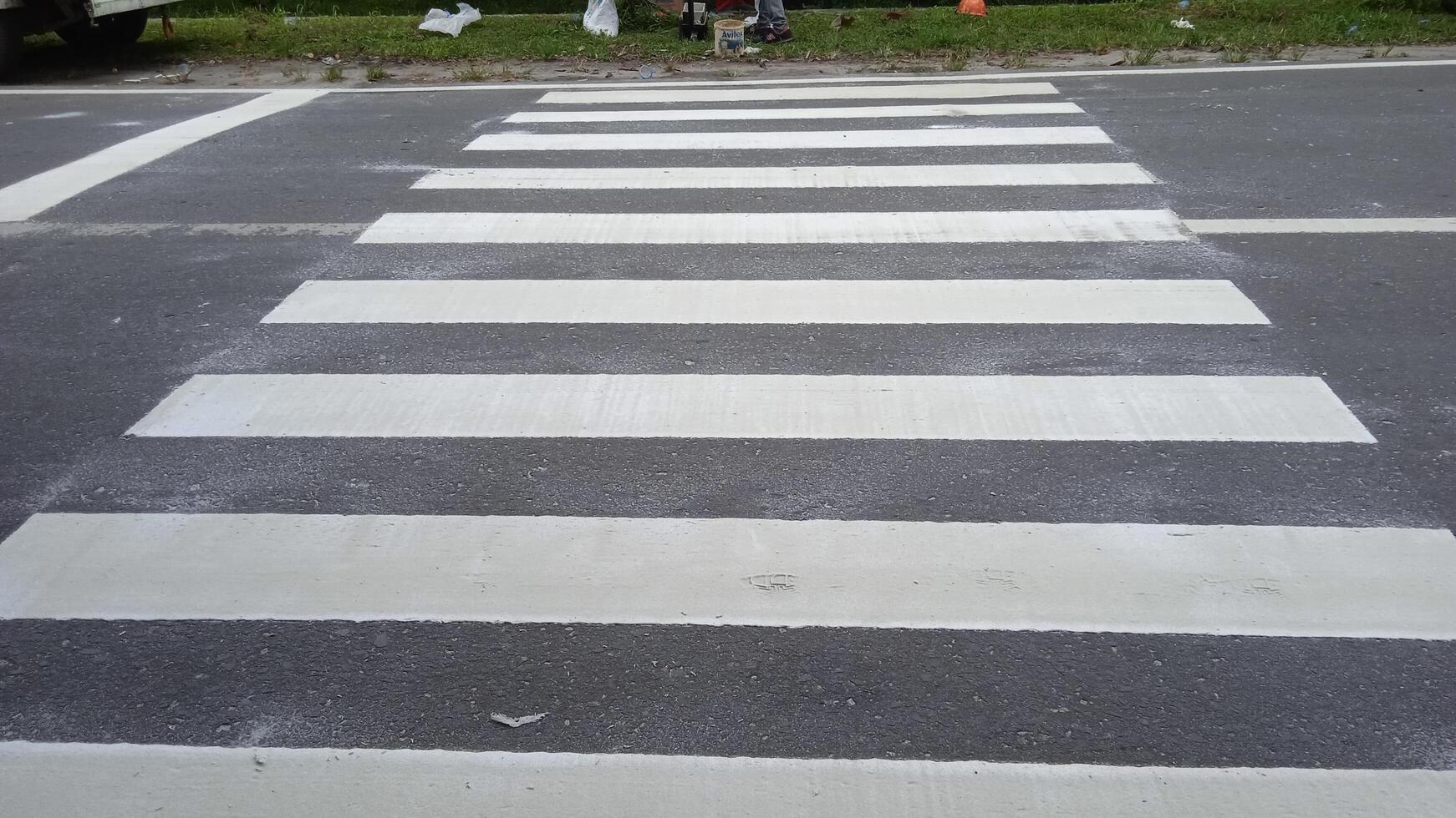Crosswalk signs on the road photo