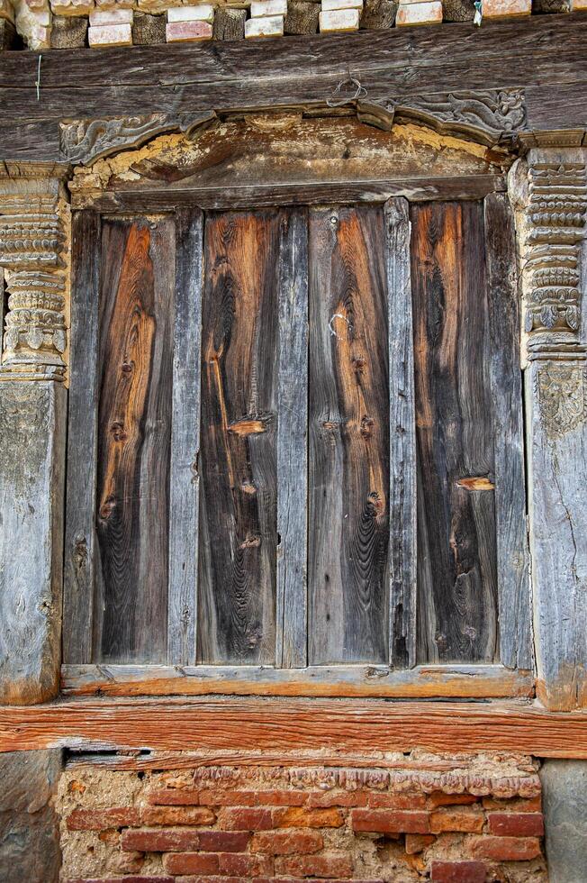 Time-honored wooden door whispers stories. photo