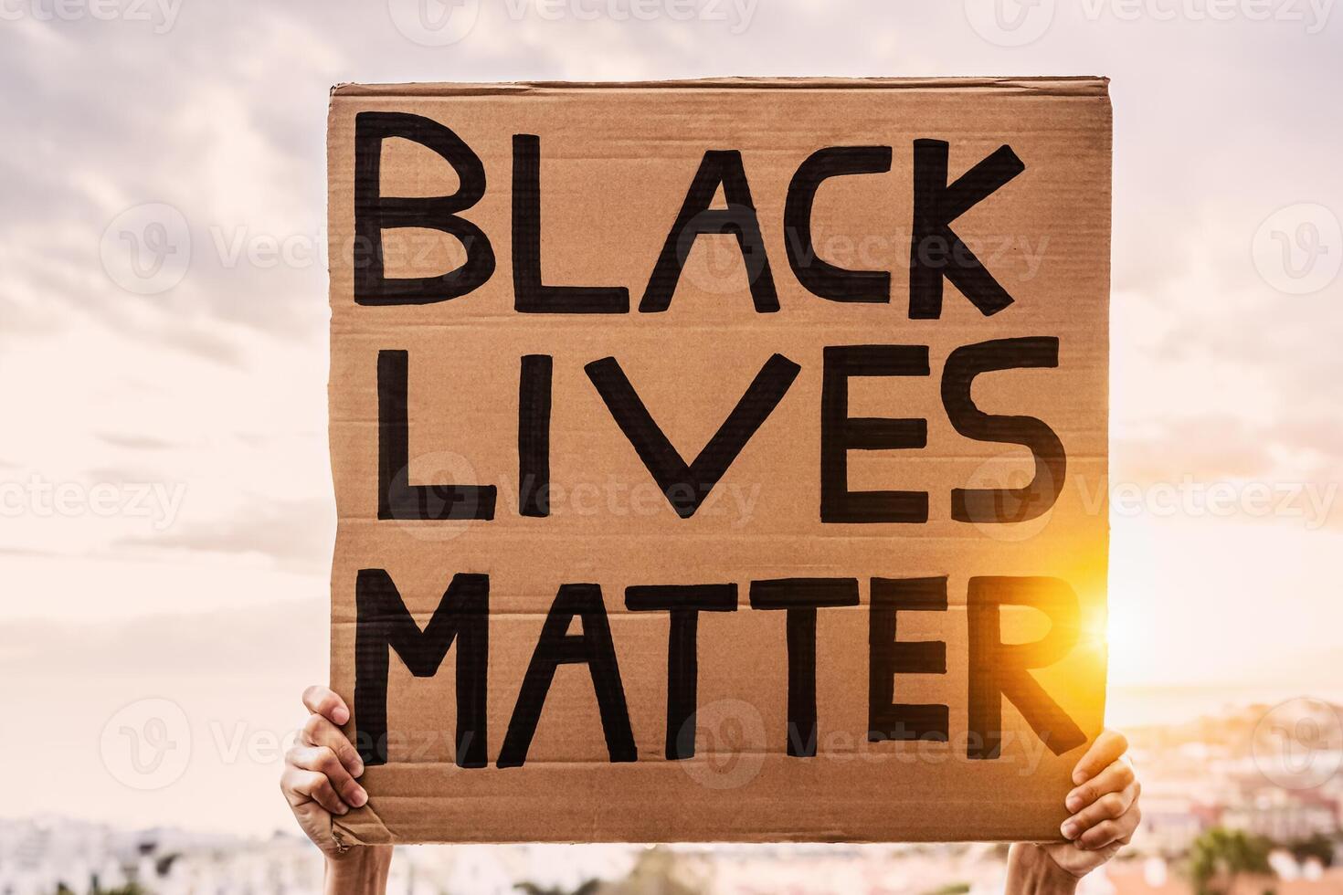 Black lives matter banner - Activist movement protesting against racism and fighting for equality - Social protests and human rights concept photo