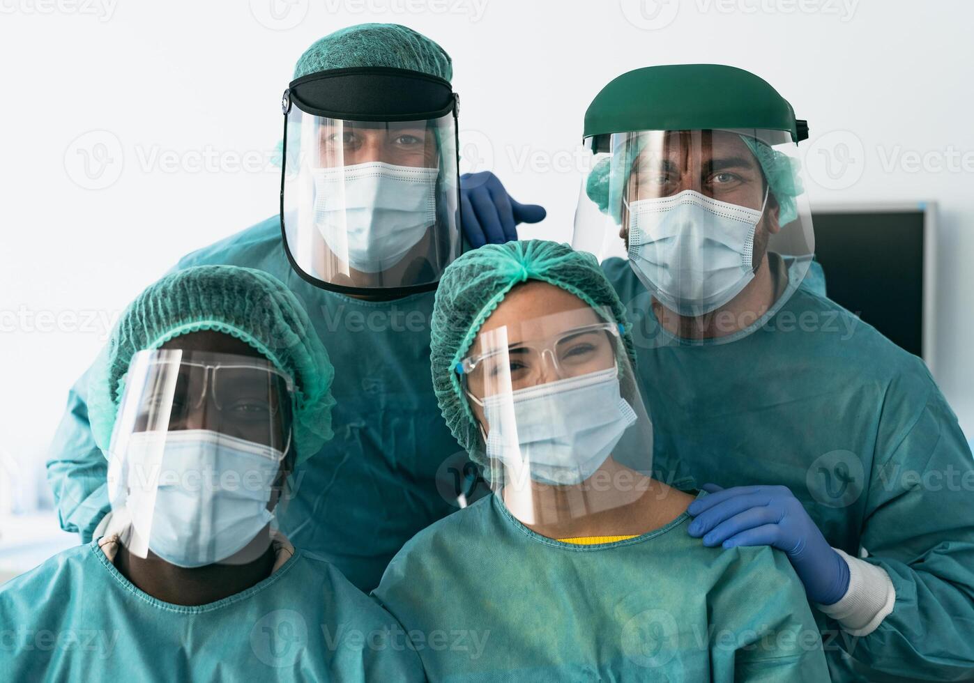 Doctors wearing personal protective equipment fighting against corona virus outbreak - Health care and medical workers concept photo