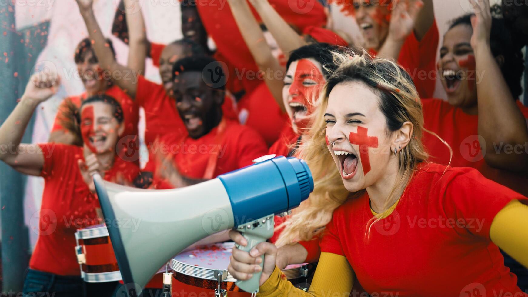 Football fans exulting during soccer game of their favorite team - Sport entertainment concept photo