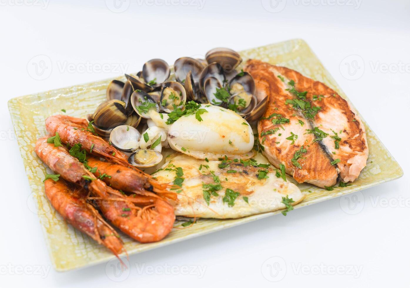 Grilled seafood in a Mediterranean restaurant photo